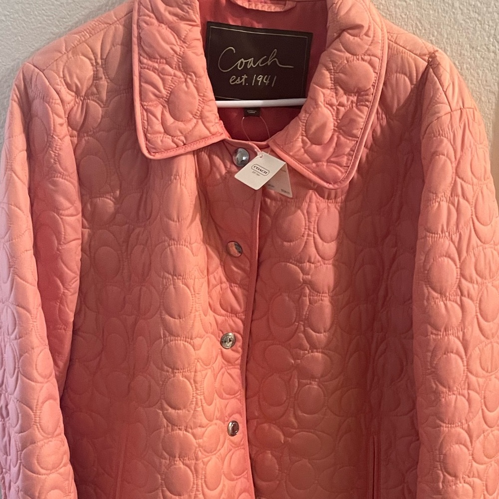 Over-sized coach quilted stg sig dusty rose coat. price negotiable.